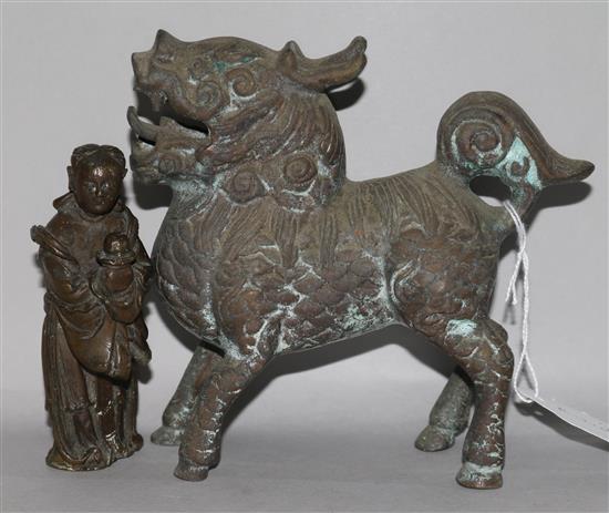 A Chinese bronze temple dog and a Chinese bronze figure